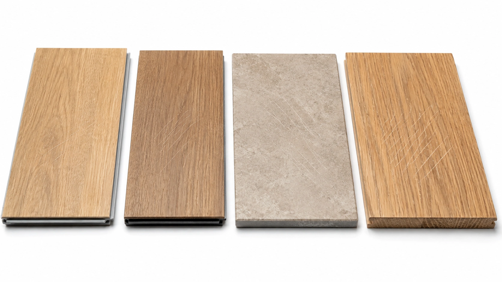 Four flooring samples after claw scratching, showing how visibly tile, laminate, luxury vinyl plank and hardwood each mark