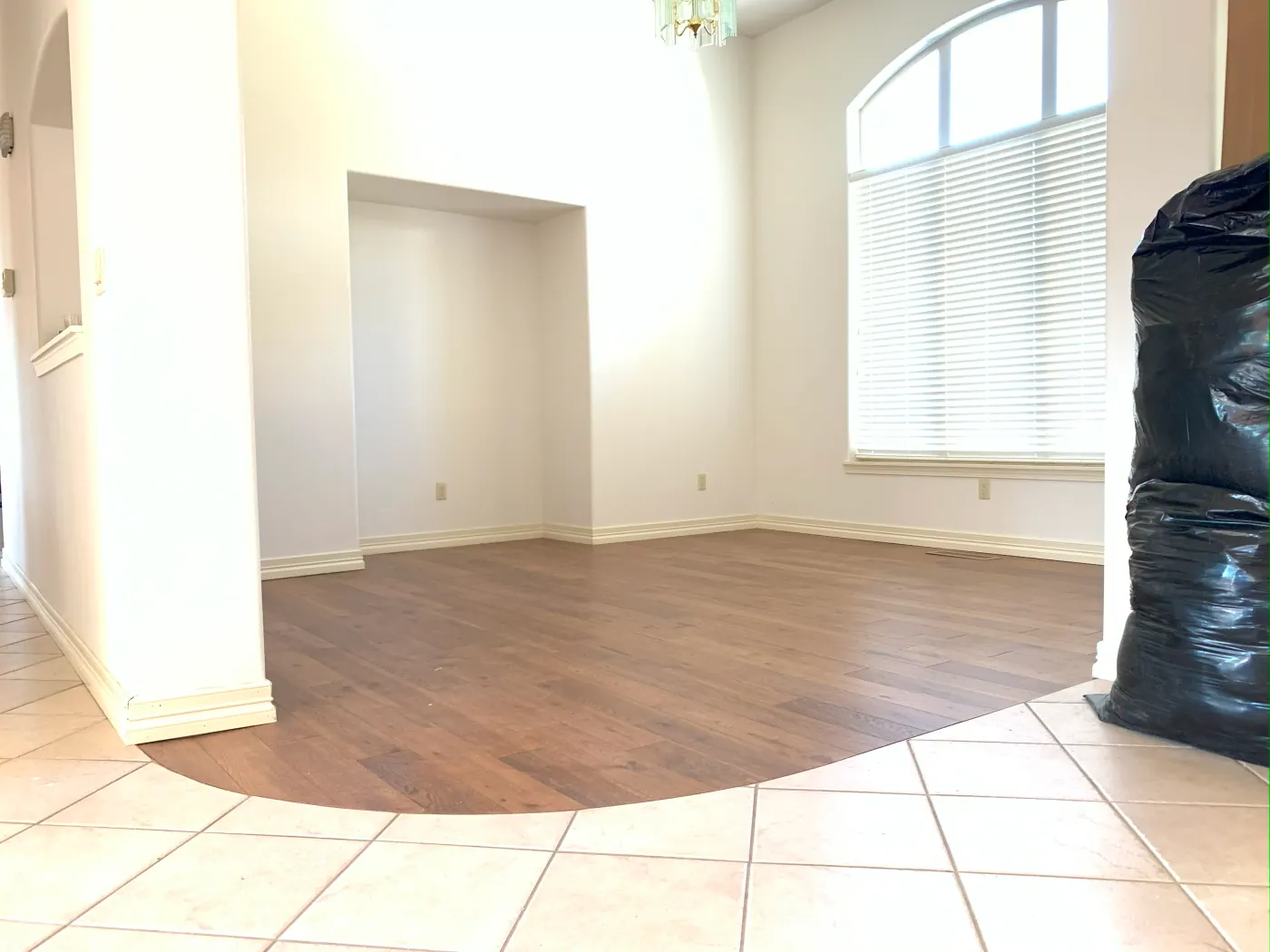 Flush transition between plank flooring and tile in a Tulsa, OK home