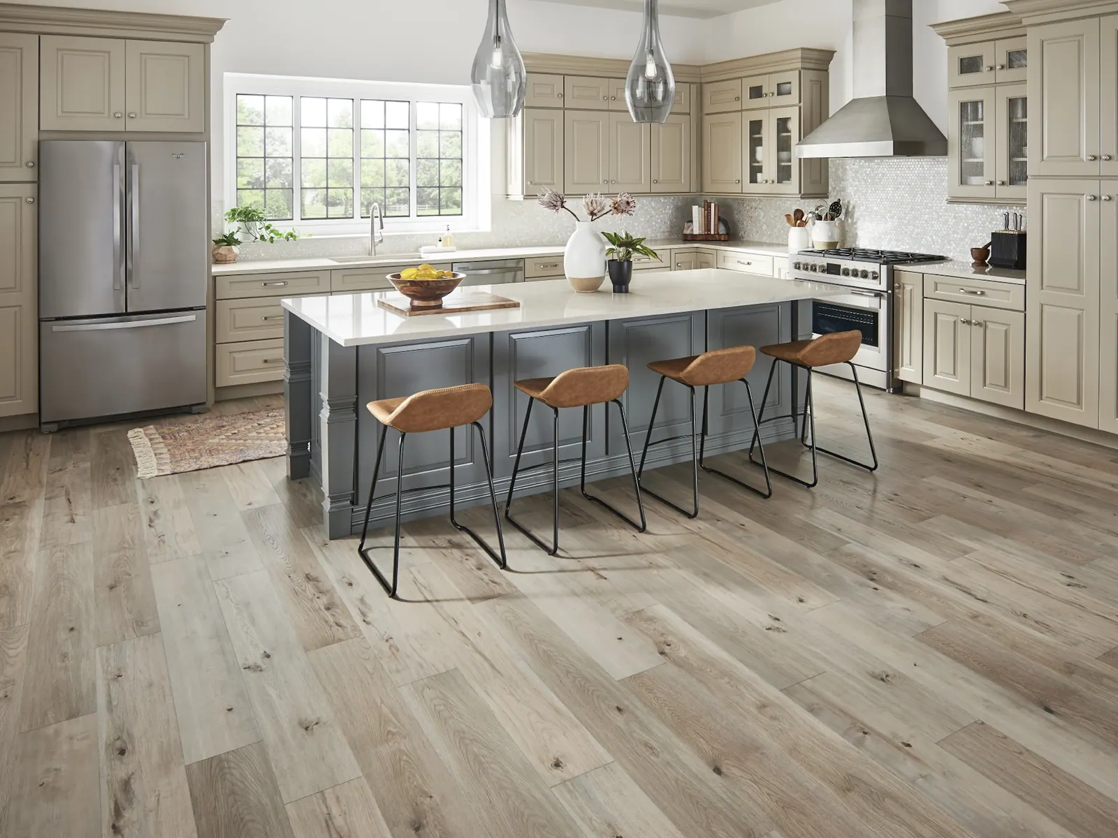 Plank flooring under a kitchen island in a Tulsa, OK home