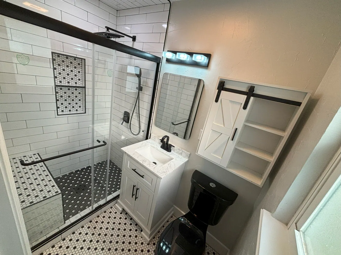 Patterned bathroom tile flooring installed in a Tulsa, OK home
