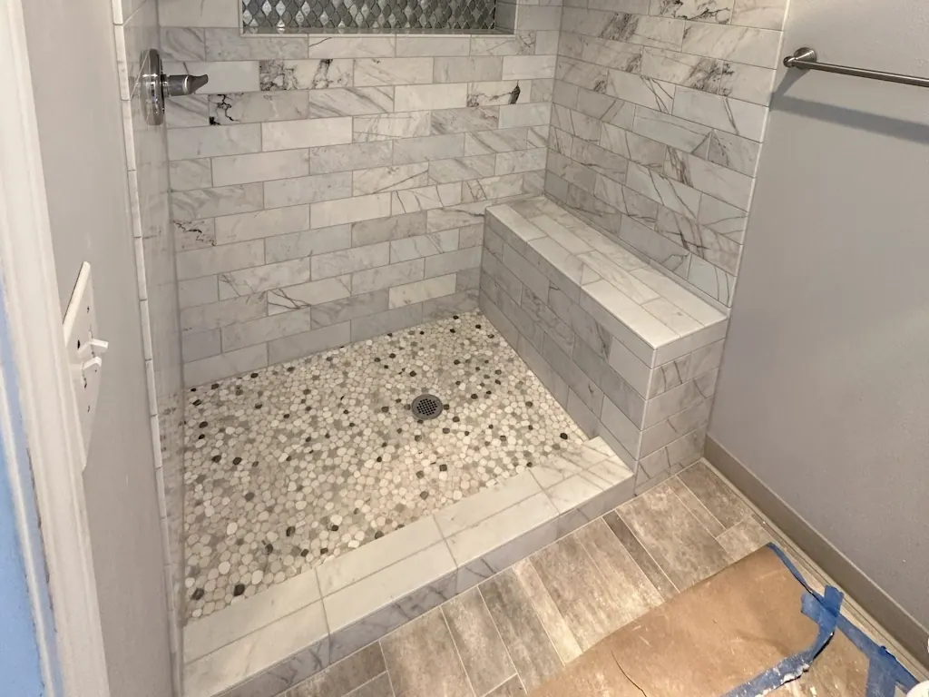 Tile flooring set in a Tulsa, OK kitchen by Foursquare Flooring