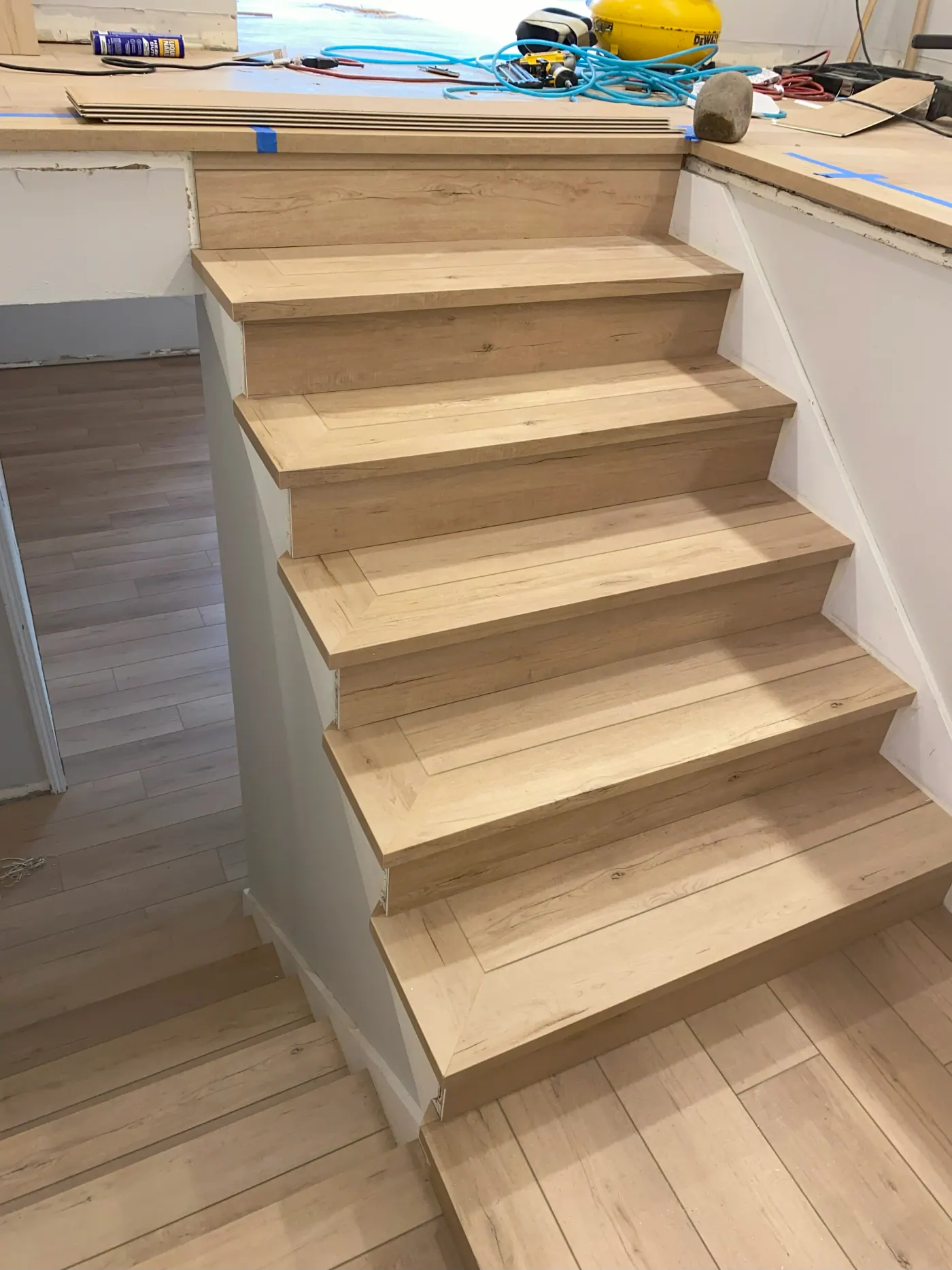 White oak hardwood stair treads matched to the floor in a Tulsa, OK home